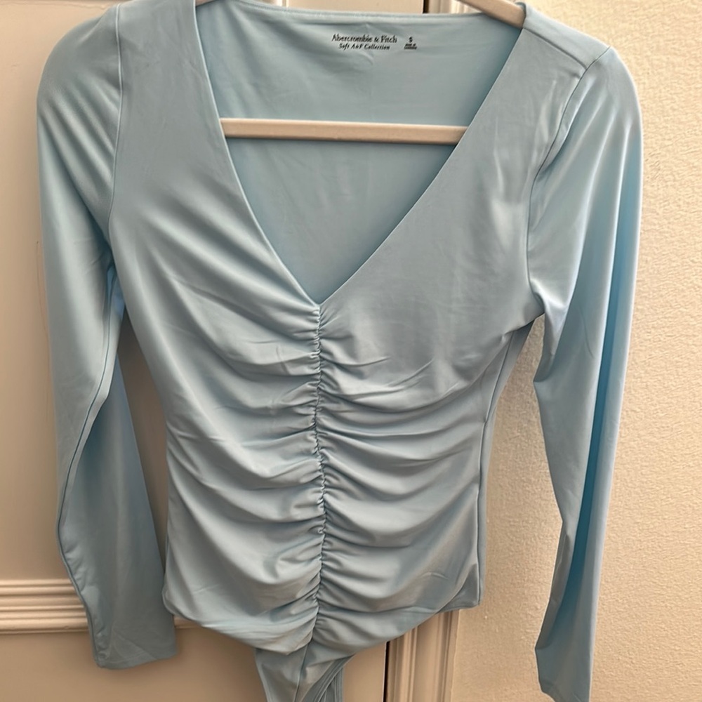 Light Blue Long Sleeve Ruched Top. Abercrombie and Fitch